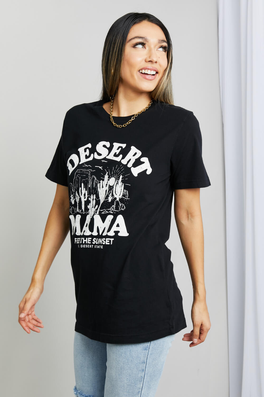 Woman modeling graphic print black tee with graphic tee with white ink - "Desert Mama - Feel the sunset the desert state"