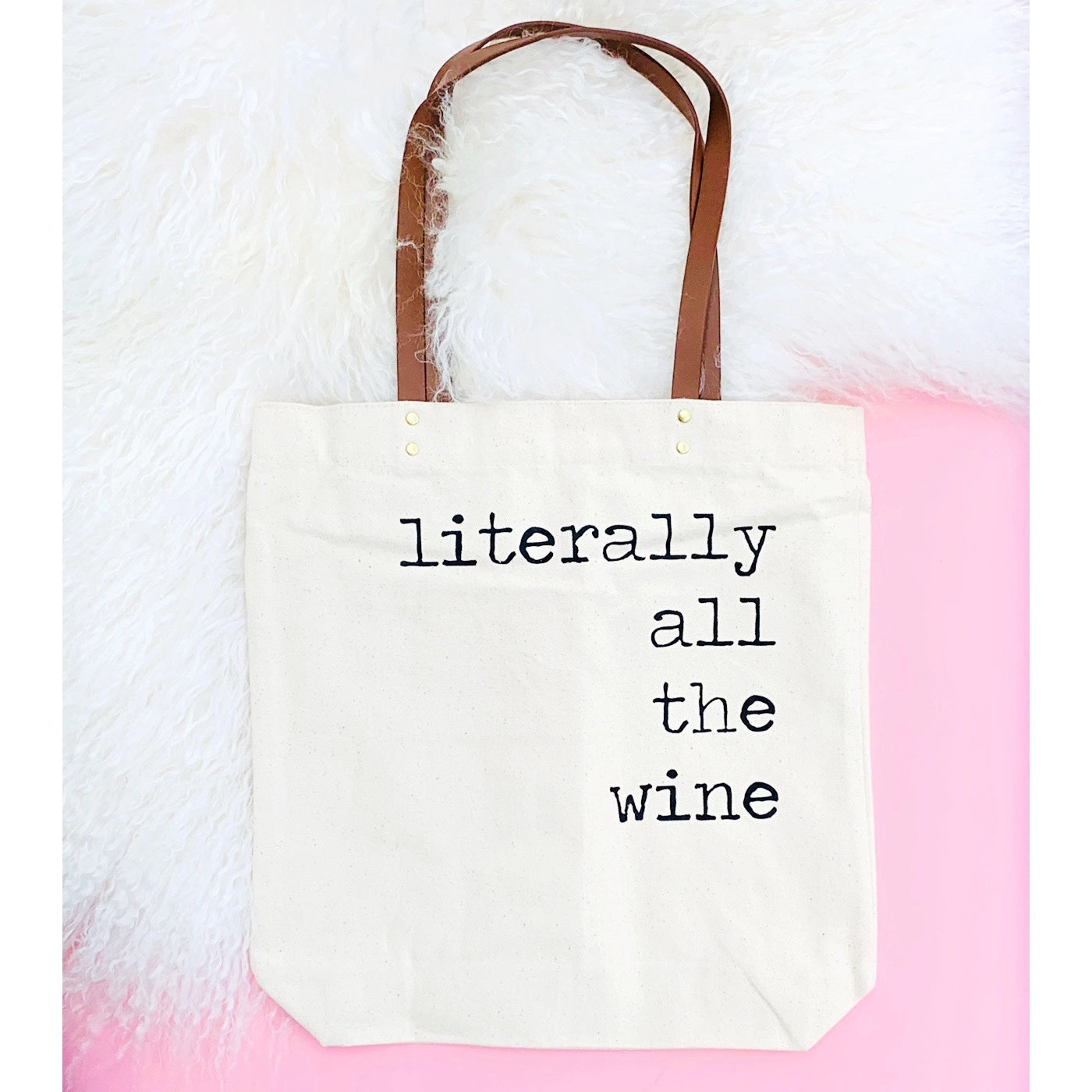 Canvas tote bag with faux leather straps that says "Literally all the wine"