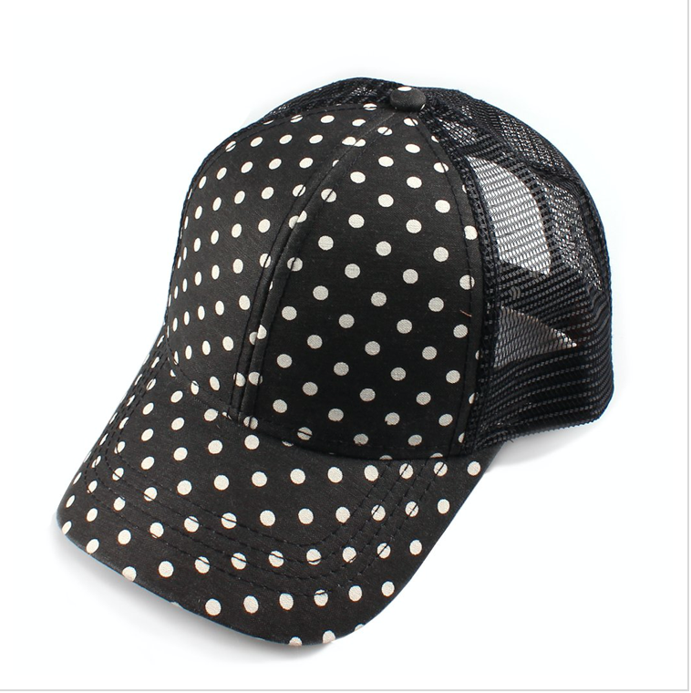 black with white polka dot hat with black mesh back.