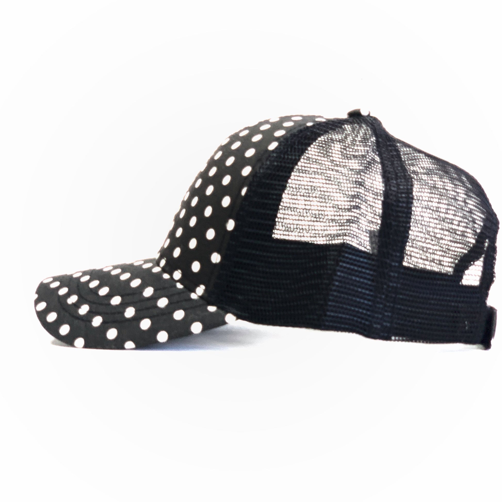 black with white polka dot hat with black mesh back.